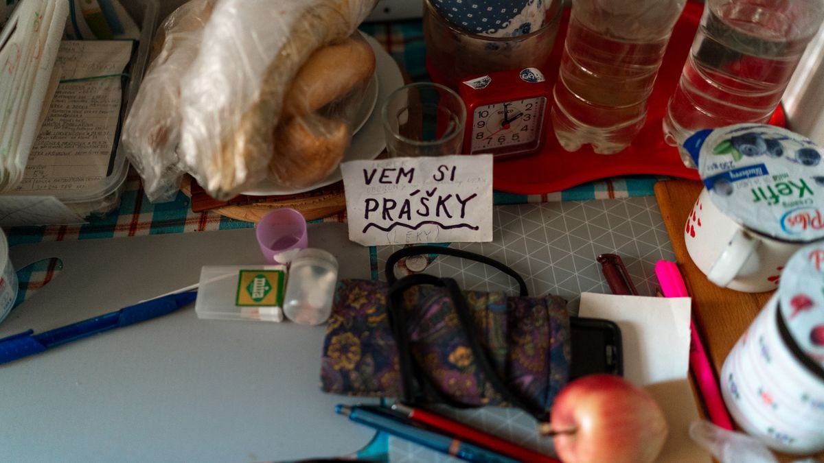 An organized Prague kitchen counter featuring food items, reminders, and daily essentials.